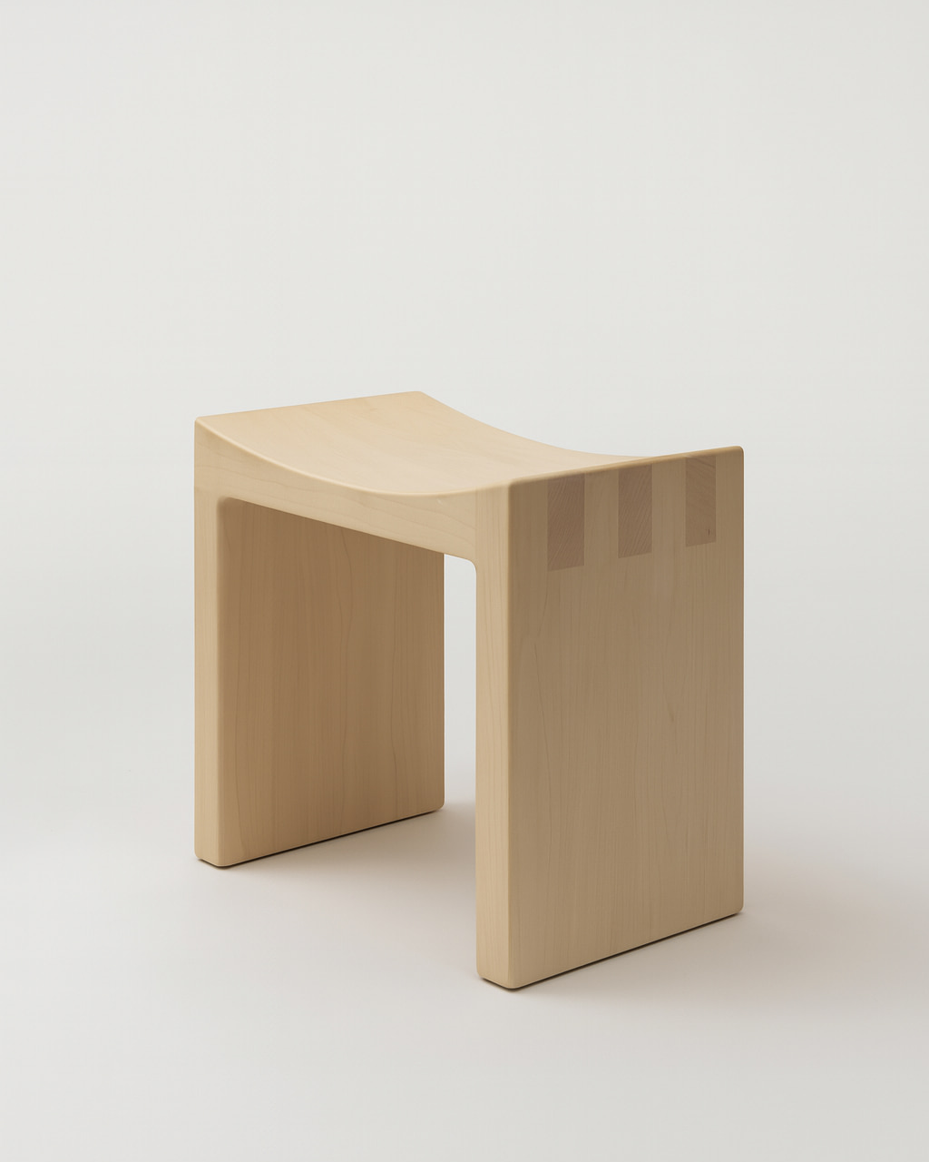 Basilio stool in solid linden with unique natural smooth wood finish