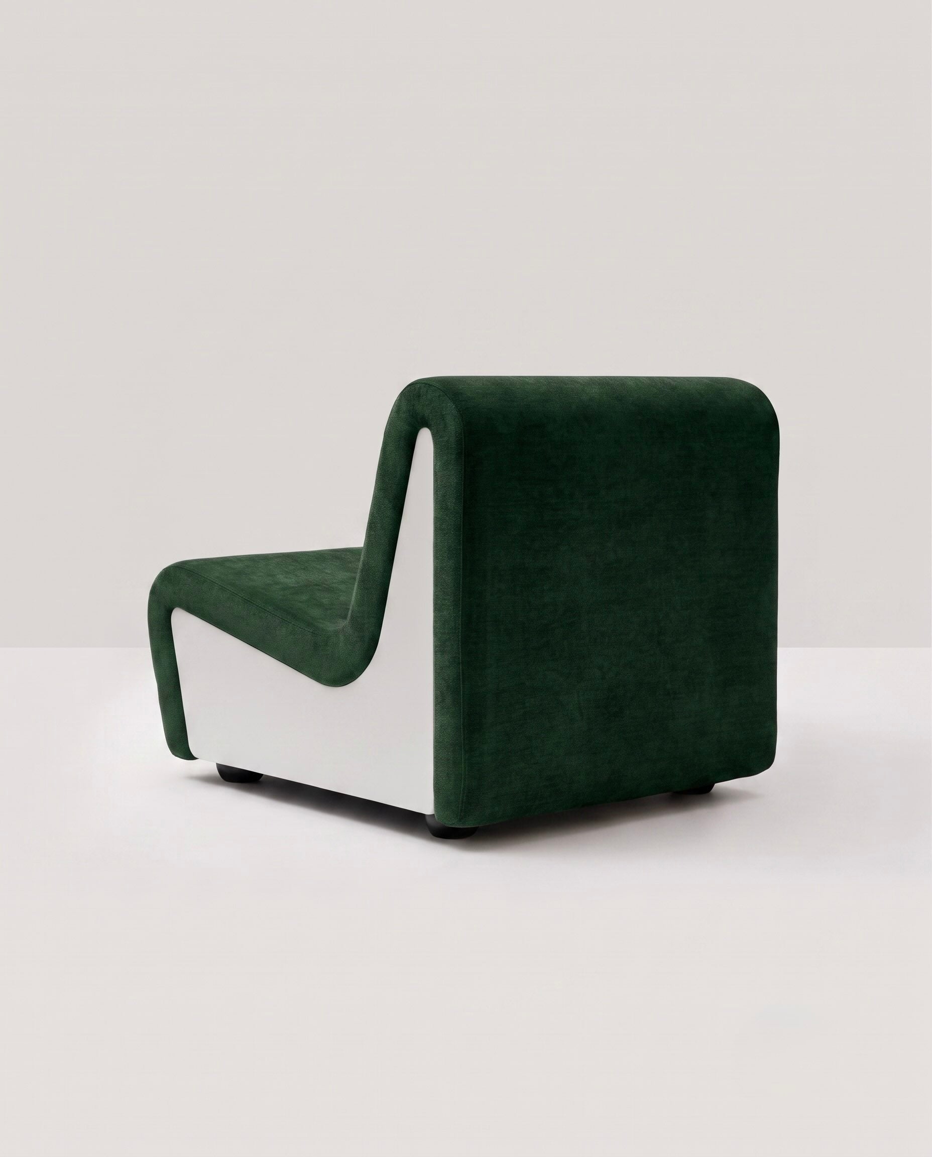 Dialogue lounge chair in Forest green fabric and white lacquered wood side panels, rear view 