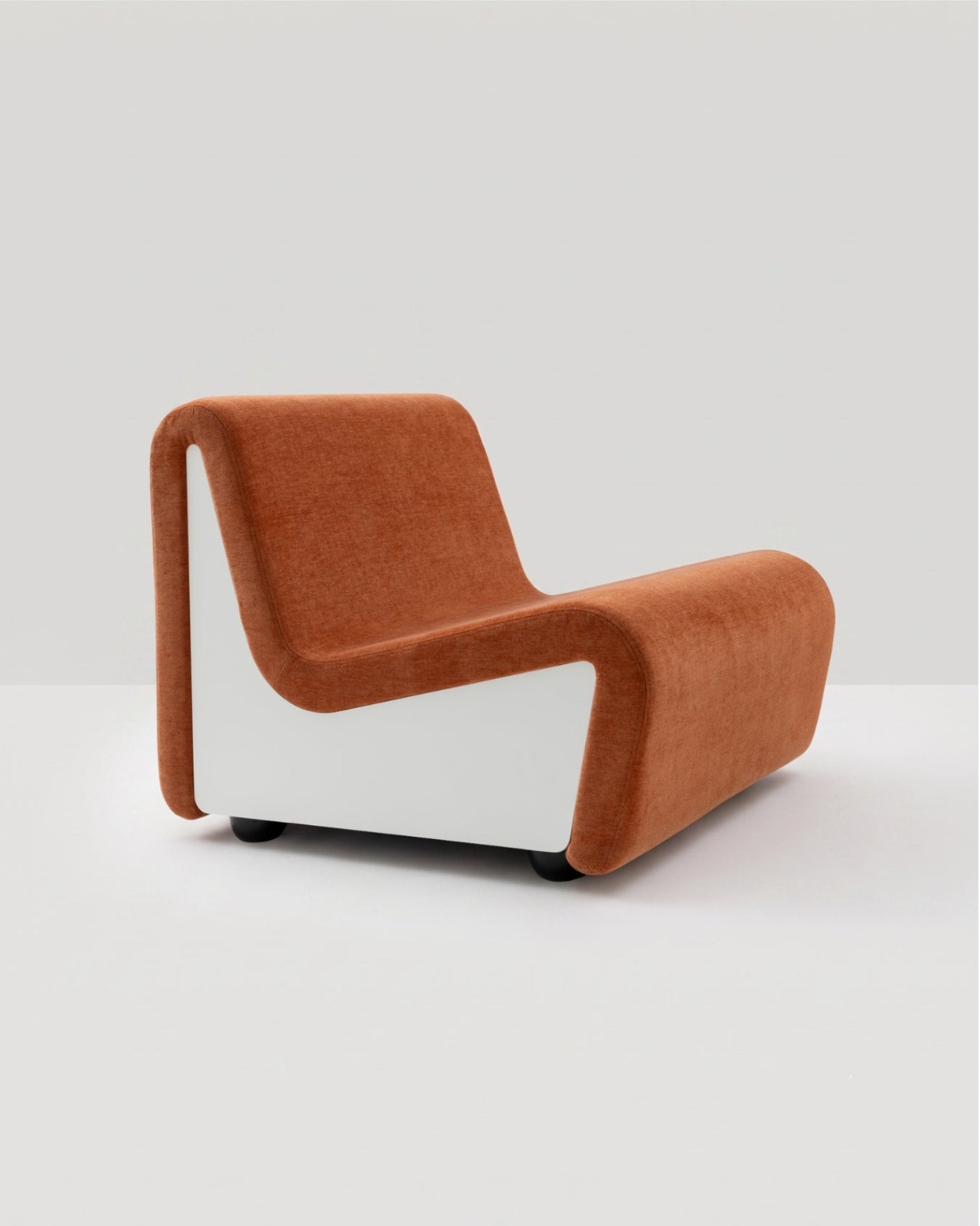 Dialogue lounge chair in Sienna orange fabric and white lacquered wood side panels