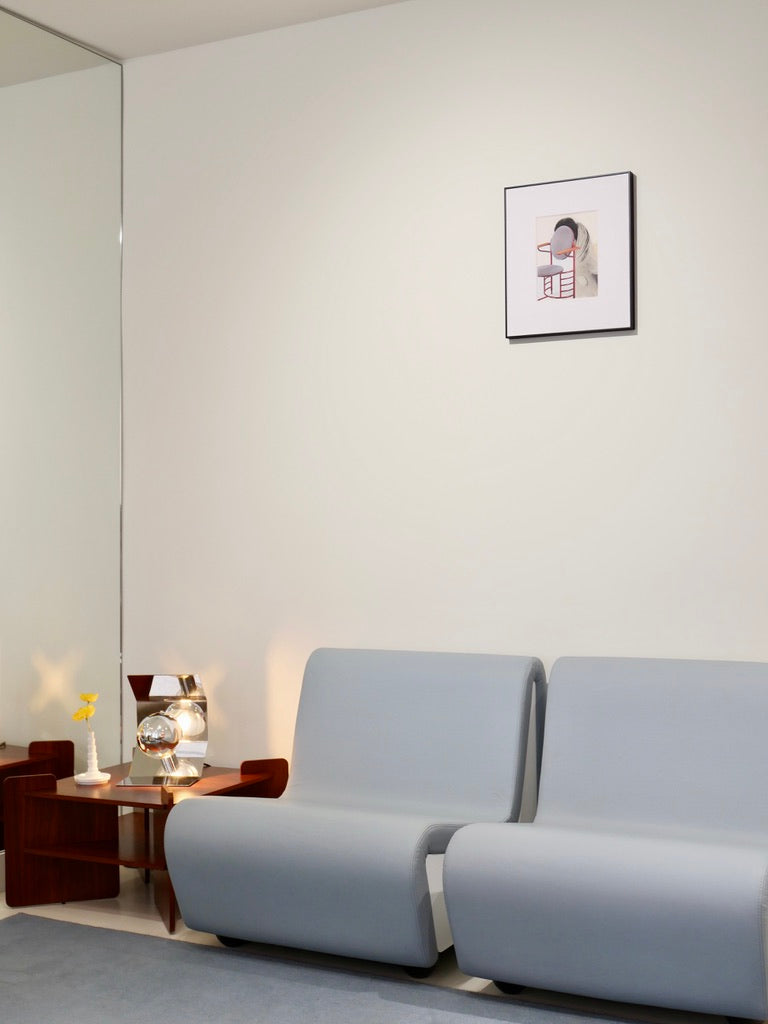 Dialogue lounge chairs by André Monpoix (1967) in Sky leather, displayed in the Source Édition Paris showroom