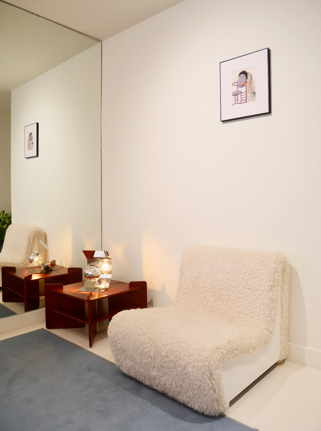 Dialogue lounge chair in faux fur and white lacquered wood side panels