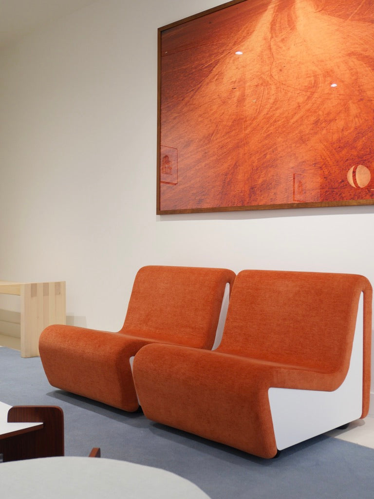 Two Dialogue lounge chairs by André Monpoix (1967) in Maia Sienna fabric, displayed in the Source Édition Paris showroom