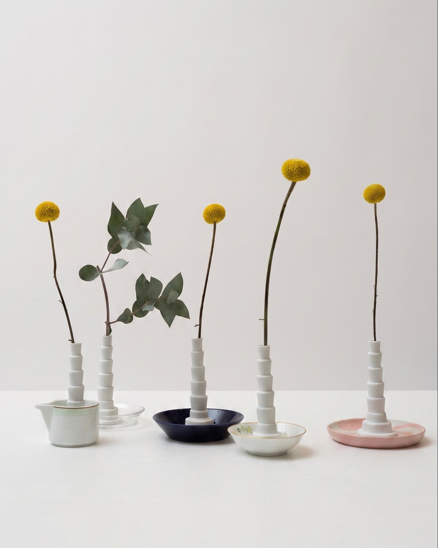 Set of 5 Miniflore No.1 unglazed porcelain minimalist vase with flowers, in different holders