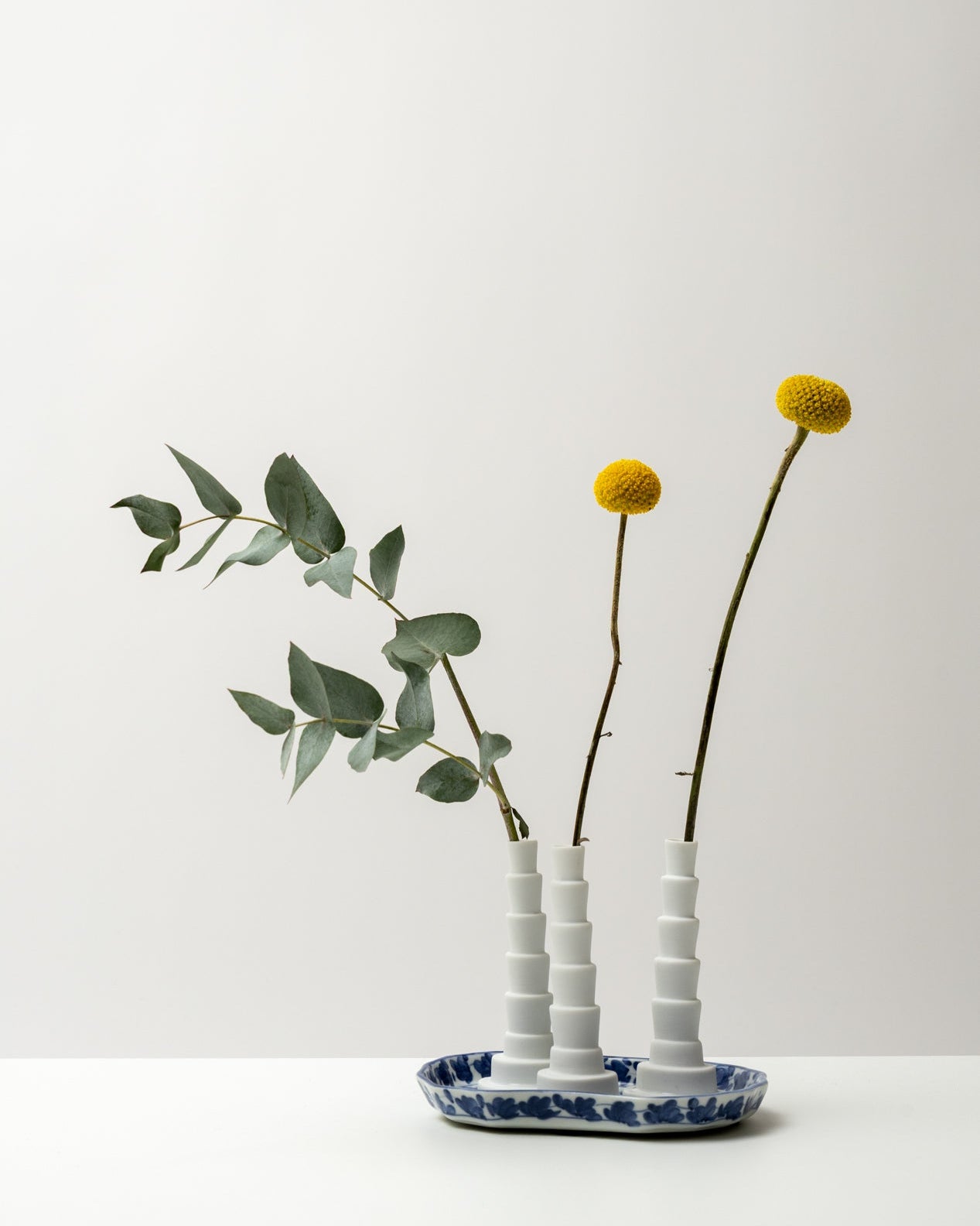 Set of 3 Miniflore No.1 unglazed porcelain minimalist vase with flowers, in decorative porcelain holder
