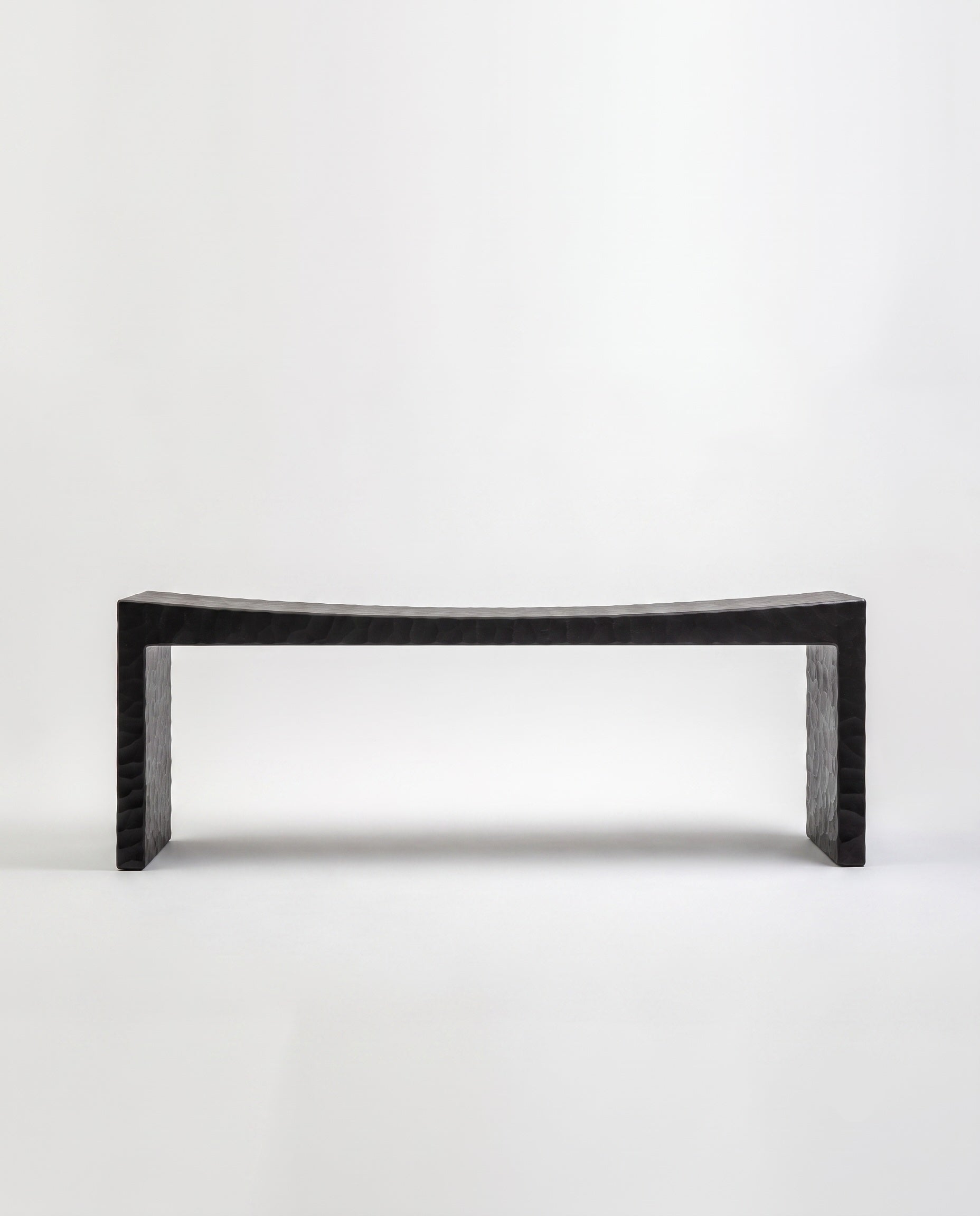 Basilio bench by Giuseppe Rivadossi – solid linden, dark gouged finish, 1970 – Source Édition