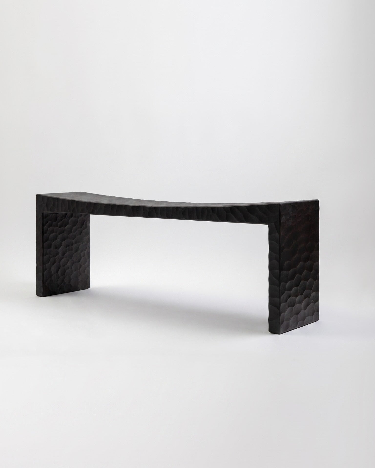 Basilio bench by Giuseppe Rivadossi – solid linden, dark gouged finish, 1970 – Source Édition