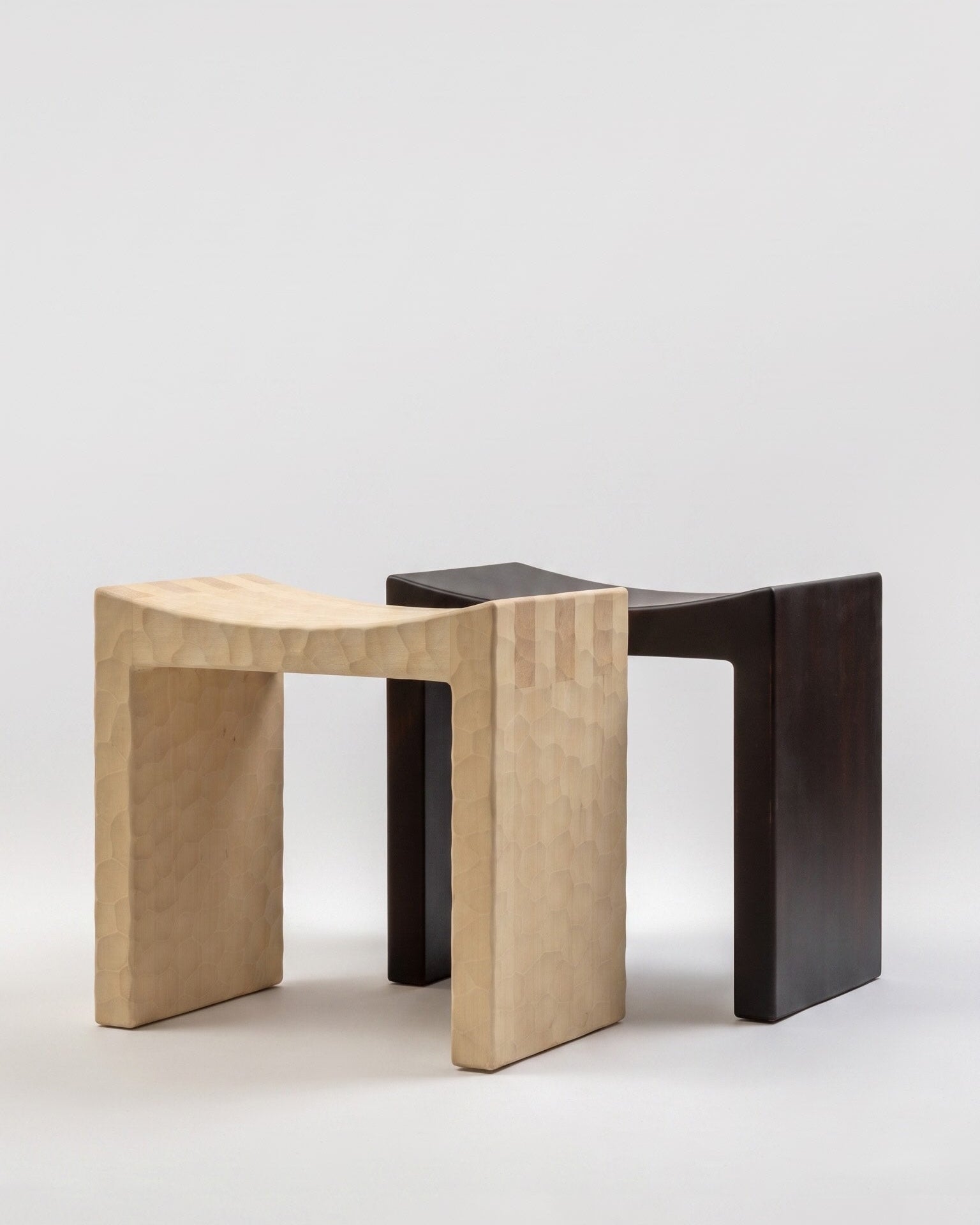 Basilio stool by Giuseppe Rivadossi – solid linden, dark smooth finish, Basilio stool - solid linden, natural gouged finish 1970 – Source Édition
