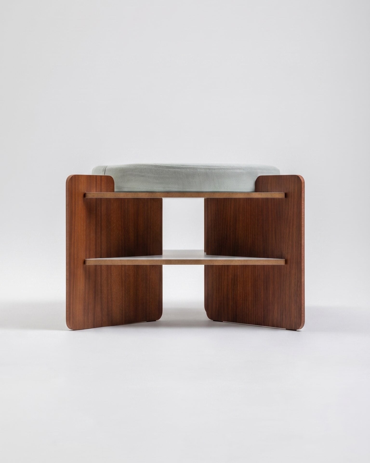 TU-TU side table topped with an Arctic Blue seat cushion, to use as a pouf, front view