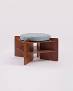 TU-TU side table, walnut veneer, topped with a blue seat cushion, to use as a pouf, front view