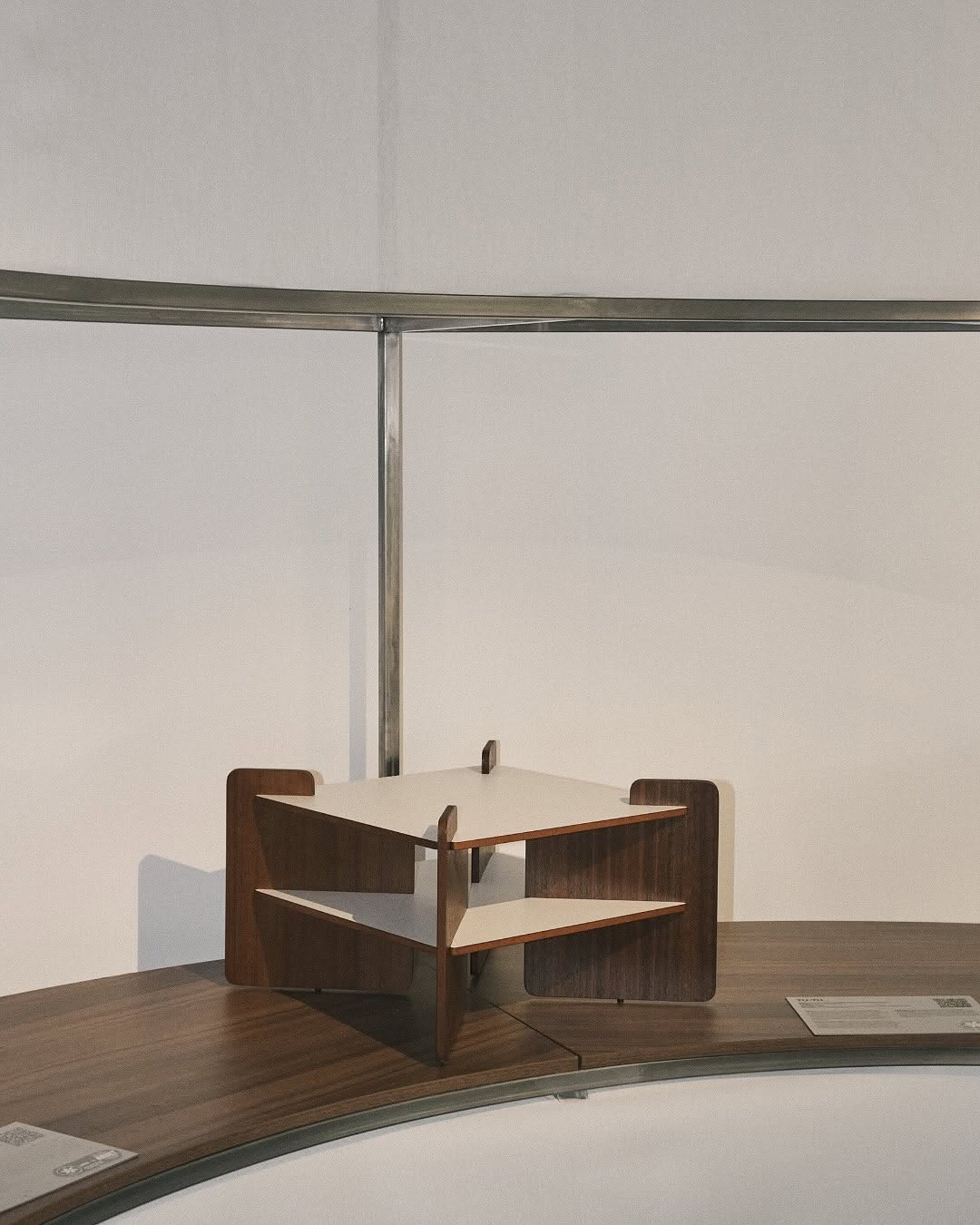 TU-TU side table by Turenne Chevallereau (1968) in varnished walnut veneer and white laminate, displayed in an exhibition