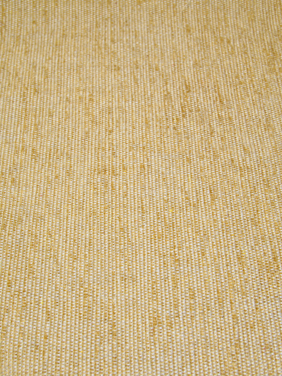 Texture of the yellow Italian fabric used for the decorative cushion