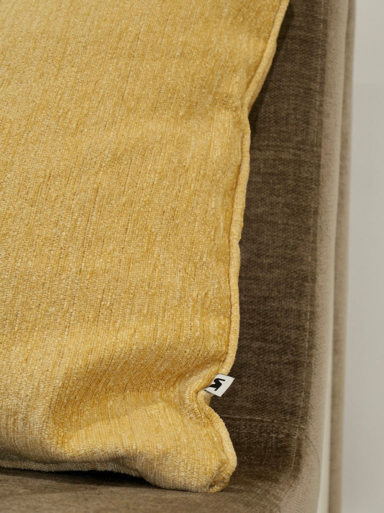Close-up of the honey decorative cushion in Italian fabric
